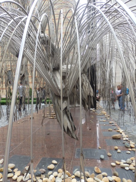The Weeping Willow memorial artwork, with stones laid in respect as the Jewish lay stones on graves 